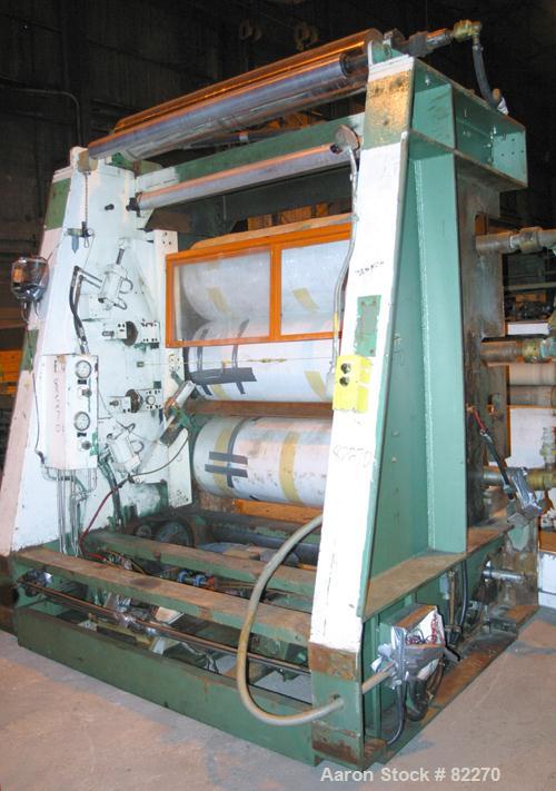 USED: Davis Standard sheet take-off unit consisting of (3) 66" face by nominal 20.8" diameter rolls, mounted in a vertical arrangement for an upstack operation. Unit includes (7) total rolls: (3) chr...