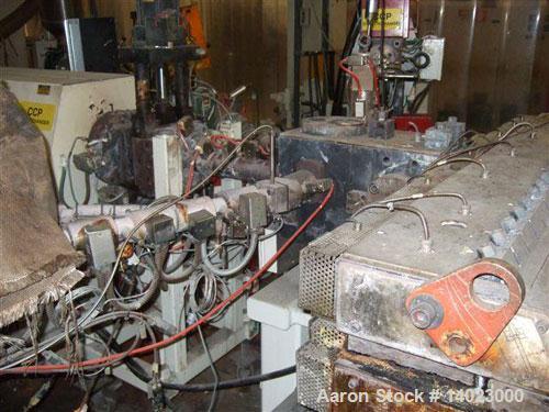 Used Egan 5 Layer Sheet Extrusion Line for the production of PS/PP barrier films with a maximum output 1000-1300 lbs/h (600 kg/h). Line completely rebuilt in 2000 consisting of: (1) Egan extruder scr...