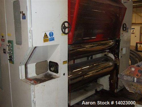 Used Egan 5 Layer Sheet Extrusion Line for the production of PS/PP barrier films with a maximum output 1000-1300 lbs/h (600 kg/h). Line completely rebuilt in 2000 consisting of: (1) Egan extruder scr...