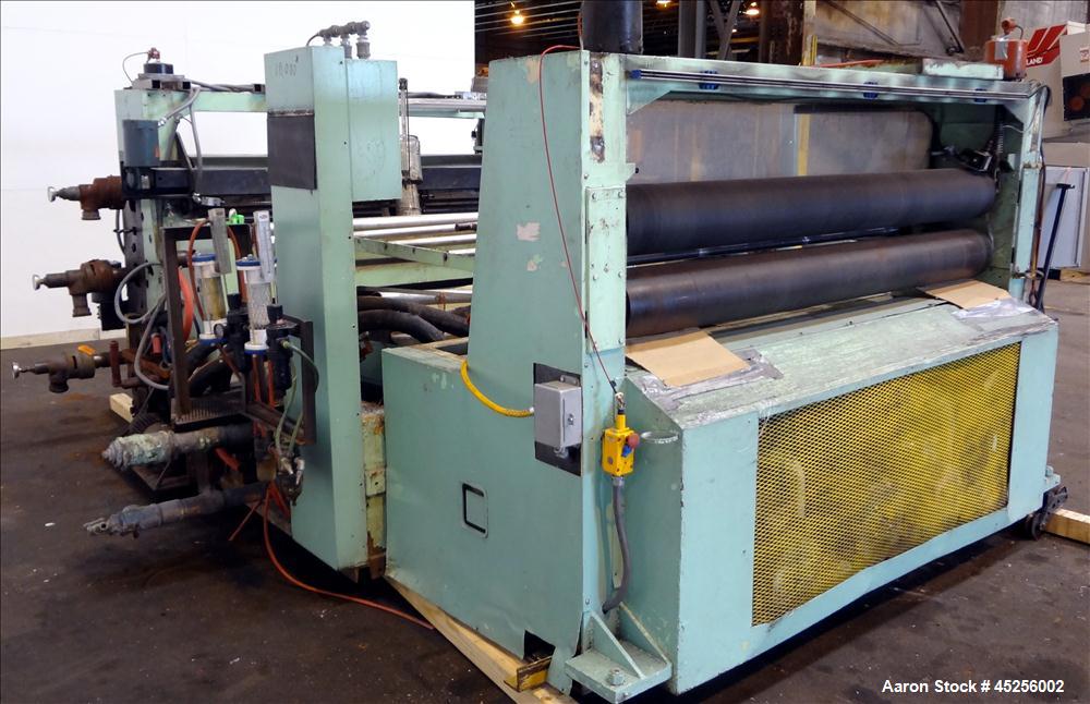 Used Goulding 3 Roll Sheet Stack. (3) 16" Diameter x 80" wide chrome plated cored rolls, (3) additional cored cooling rolls, approximate 48" long cooling section, (2) 8" diameter x 80" wide rubber pu...