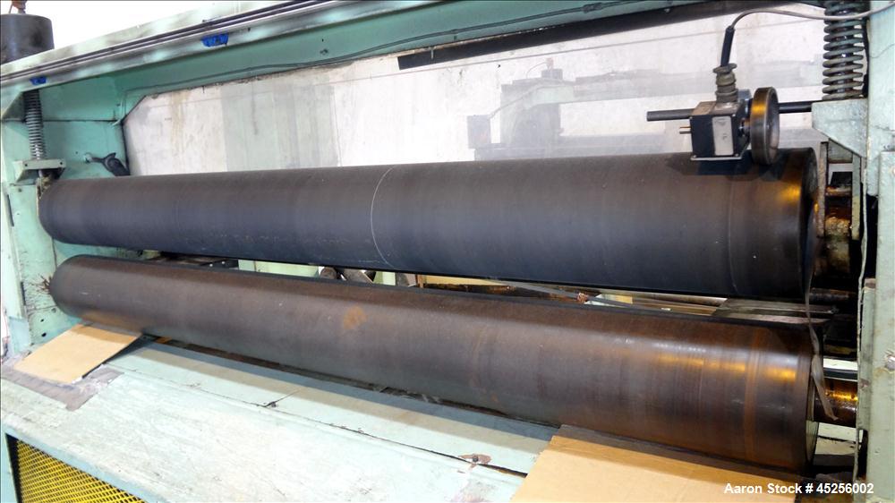 Used Goulding 3 Roll Sheet Stack. (3) 16" Diameter x 80" wide chrome plated cored rolls, (3) additional cored cooling rolls, approximate 48" long cooling section, (2) 8" diameter x 80" wide rubber pu...