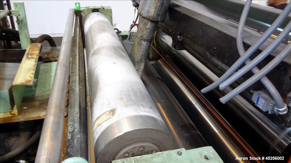Used Goulding 3 Roll Sheet Stack. (3) 16" Diameter x 80" wide chrome plated cored rolls, (3) additional cored cooling rolls, approximate 48" long cooling section, (2) 8" diameter x 80" wide rubber pu...