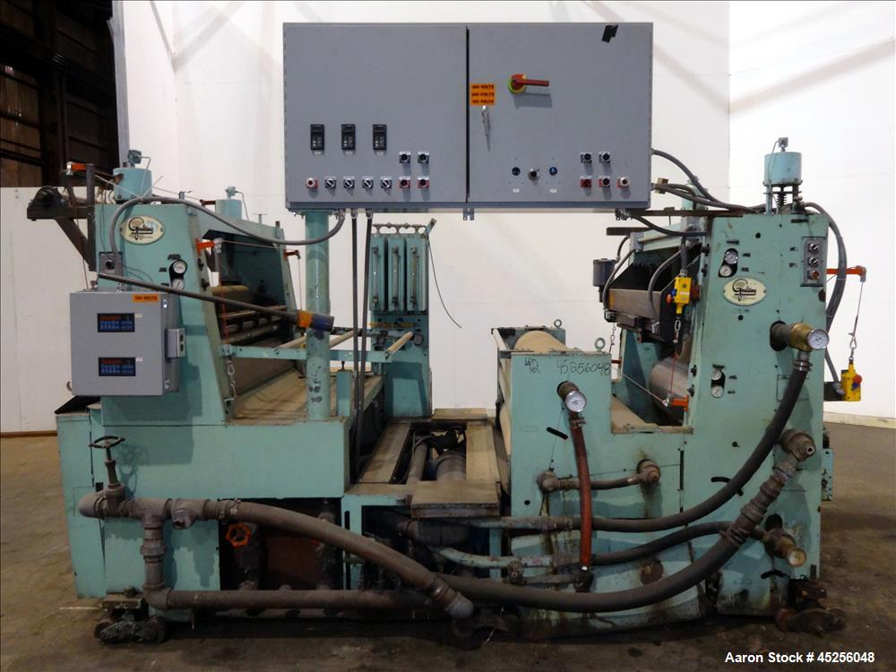 Used Goulding 3 roll sheet stack, (3) 16" diameter x 52" wide chrome plated cored rolls, (3) additional cored cooling rolls, approximate 48" long cooling section, (2) 8" diameter x 52" long rubber pu...