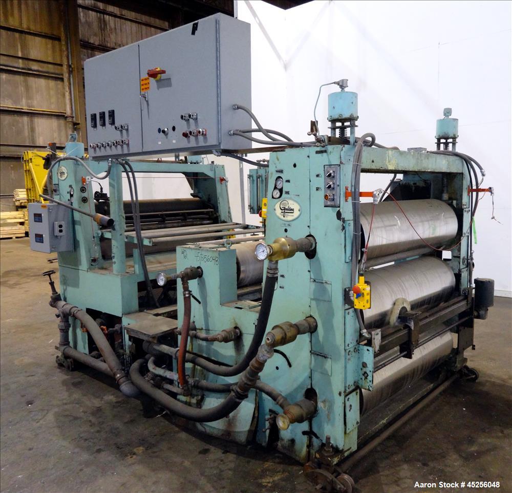 Used Goulding 3 roll sheet stack, (3) 16" diameter x 52" wide chrome plated cored rolls, (3) additional cored cooling rolls, approximate 48" long cooling section, (2) 8" diameter x 52" long rubber pu...