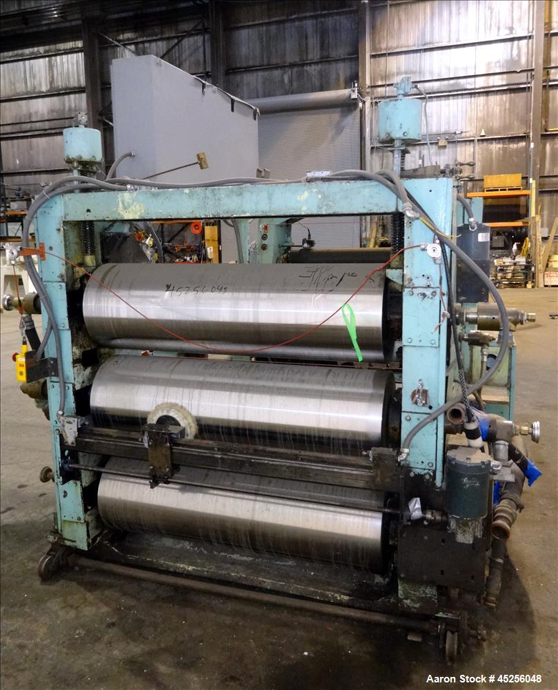 Used Goulding 3 roll sheet stack, (3) 16" diameter x 52" wide chrome plated cored rolls, (3) additional cored cooling rolls, approximate 48" long cooling section, (2) 8" diameter x 52" long rubber pu...
