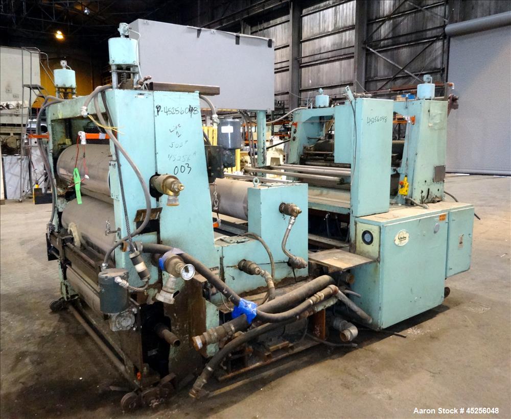Used Goulding 3 roll sheet stack, (3) 16" diameter x 52" wide chrome plated cored rolls, (3) additional cored cooling rolls, approximate 48" long cooling section, (2) 8" diameter x 52" long rubber pu...