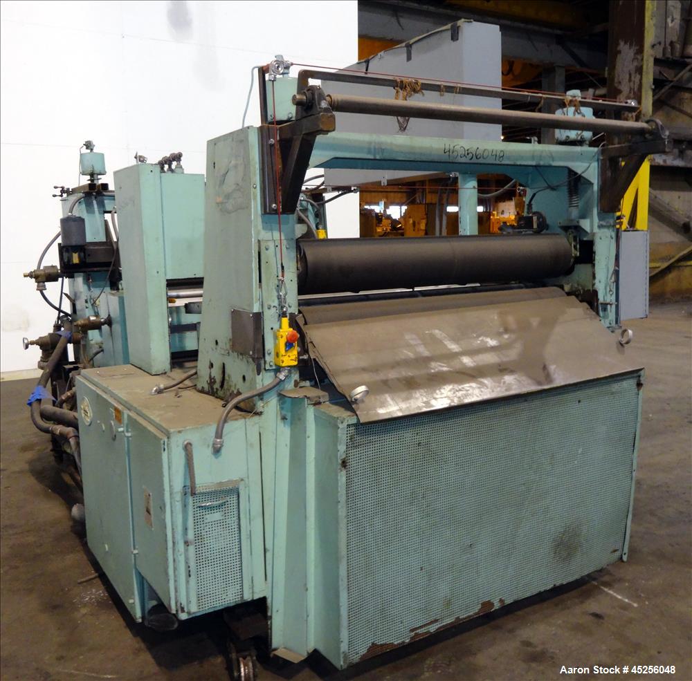 Used Goulding 3 roll sheet stack, (3) 16" diameter x 52" wide chrome plated cored rolls, (3) additional cored cooling rolls, approximate 48" long cooling section, (2) 8" diameter x 52" long rubber pu...