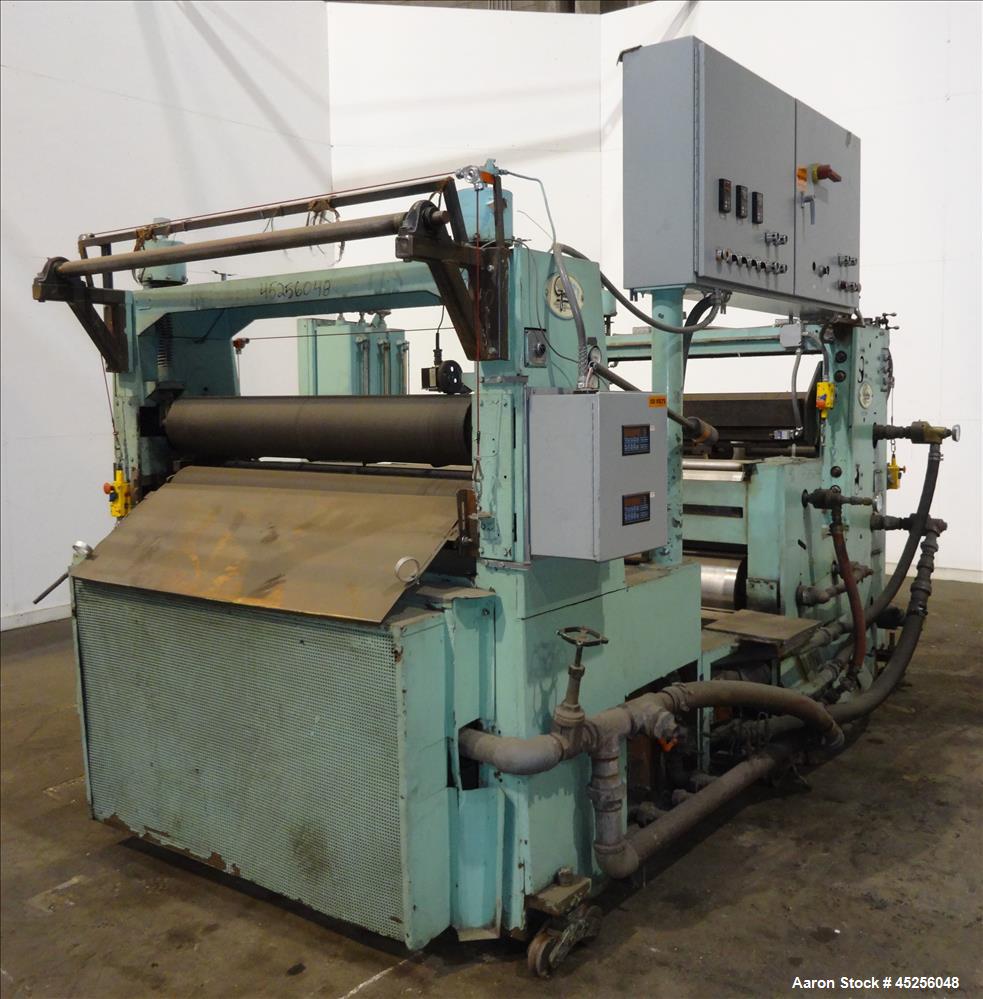 Used Goulding 3 roll sheet stack, (3) 16" diameter x 52" wide chrome plated cored rolls, (3) additional cored cooling rolls, approximate 48" long cooling section, (2) 8" diameter x 52" long rubber pu...