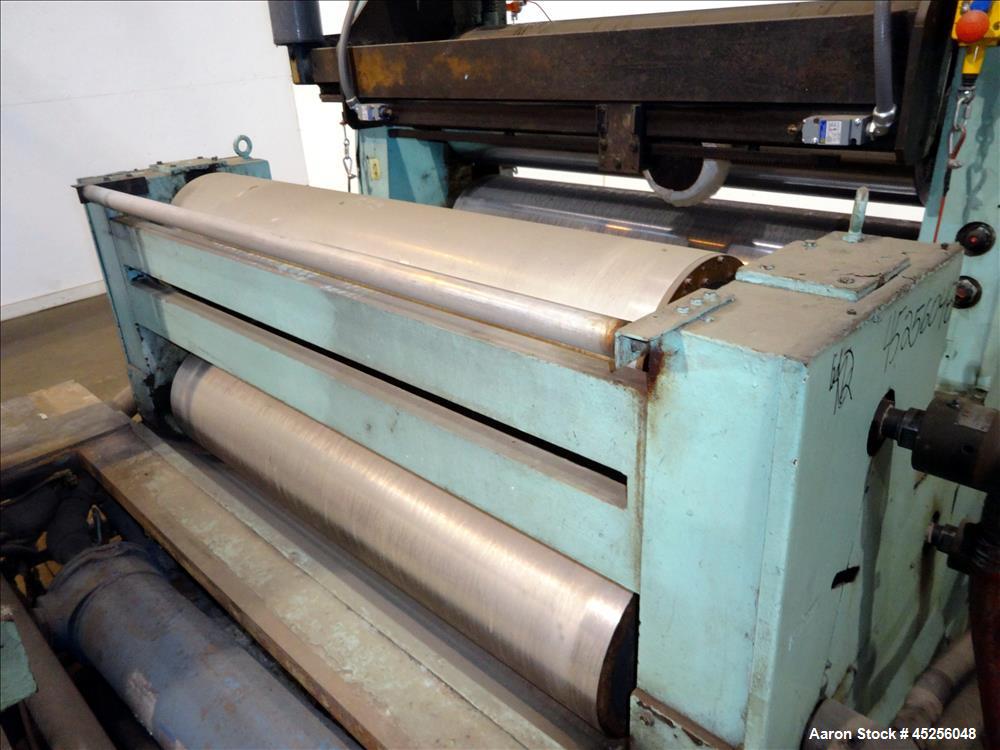 Used Goulding 3 roll sheet stack, (3) 16" diameter x 52" wide chrome plated cored rolls, (3) additional cored cooling rolls, approximate 48" long cooling section, (2) 8" diameter x 52" long rubber pu...