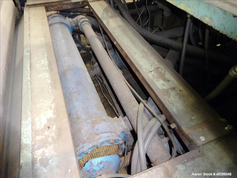 Used Goulding 3 roll sheet stack, (3) 16" diameter x 52" wide chrome plated cored rolls, (3) additional cored cooling rolls, approximate 48" long cooling section, (2) 8" diameter x 52" long rubber pu...
