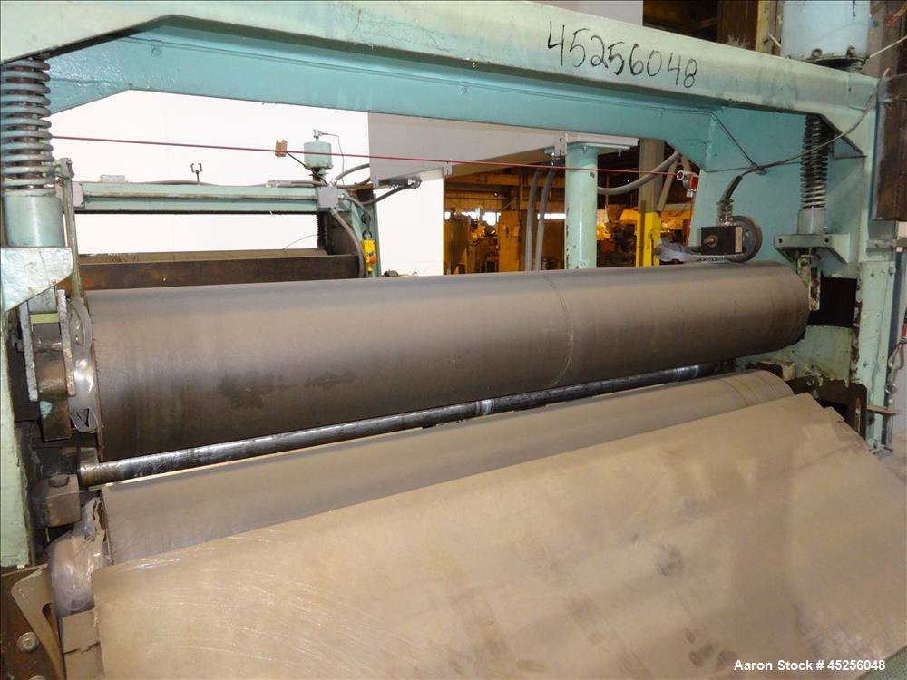 Used Goulding 3 roll sheet stack, (3) 16" diameter x 52" wide chrome plated cored rolls, (3) additional cored cooling rolls, approximate 48" long cooling section, (2) 8" diameter x 52" long rubber pu...