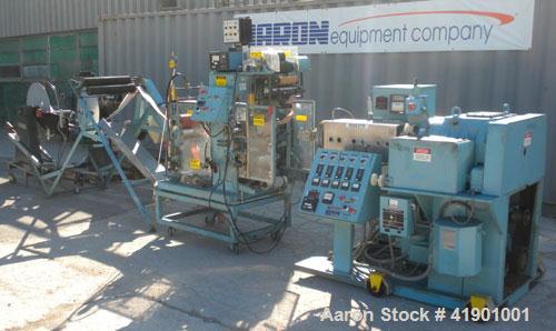  Killion 2-1/2'' single screw extruder, model KN250, approximately 10 to 1 L/D ratio. Electrically heated, air cooled 3 zone non-vented barrel. Water cooled feed throat with a roll type feeder. Appro...