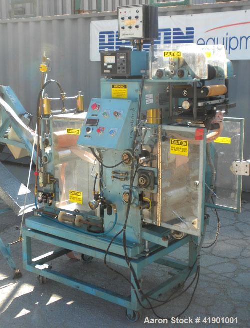  Killion 2-1/2'' single screw extruder, model KN250, approximately 10 to 1 L/D ratio. Electrically heated, air cooled 3 zone non-vented barrel. Water cooled feed throat with a roll type feeder. Appro...