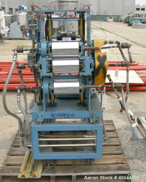 Used Killion 3 roll sheet stack. (3) 5" diameter x 8" wide chrome plated cored rolls, pneumatically adjustable, (1) 5" diameter x 8" wide chrome, (1) 5" diameter x 8" wide rubber pull roll, pneumatic...