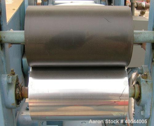 Used- Killion 3 roll sheet stack. (3) 5" diameter x 8" wide chrome plated cored rolls, pneumatically adjustable, (1) 5" diam...