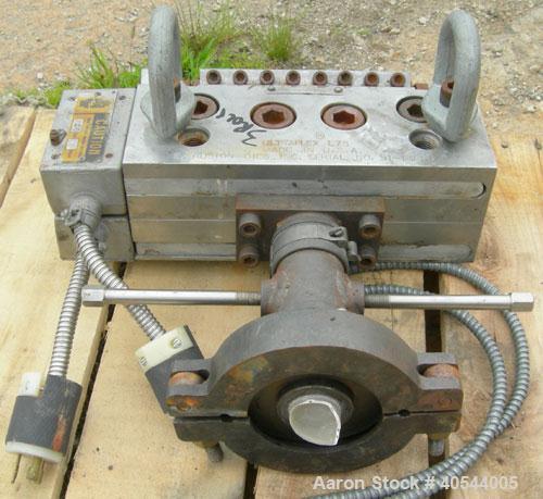 Used Killion 3 roll sheet stack. (3) 5" diameter x 8" wide chrome plated cored rolls, pneumatically adjustable, (1) 5" diameter x 8" wide chrome, (1) 5" diameter x 8" wide rubber pull roll, pneumatic...