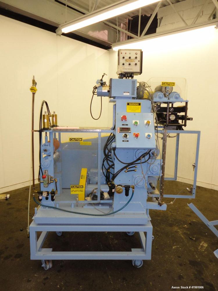 Used Killion 3 roll sheet stack with (3) top mounted pull rolls, (1) 4-1/2'' diameter x 10'' wide rubber roll, and (2) 4'' diameter x 10'' wide adhesive rolls, driven by a 1/4 hp DC gear motor, (3) m...