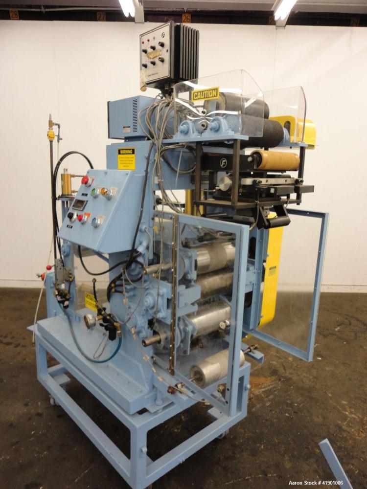Used Killion 3 roll sheet stack with (3) top mounted pull rolls, (1) 4-1/2'' diameter x 10'' wide rubber roll, and (2) 4'' diameter x 10'' wide adhesive rolls, driven by a 1/4 hp DC gear motor, (3) m...