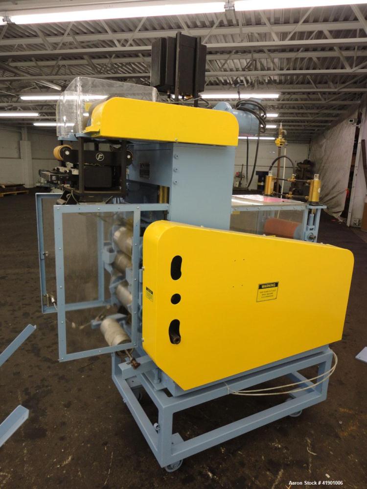 Used Killion 3 roll sheet stack with (3) top mounted pull rolls, (1) 4-1/2'' diameter x 10'' wide rubber roll, and (2) 4'' diameter x 10'' wide adhesive rolls, driven by a 1/4 hp DC gear motor, (3) m...