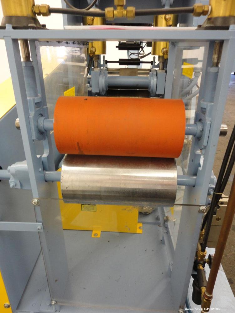 Used Killion 3 roll sheet stack with (3) top mounted pull rolls, (1) 4-1/2'' diameter x 10'' wide rubber roll, and (2) 4'' diameter x 10'' wide adhesive rolls, driven by a 1/4 hp DC gear motor, (3) m...