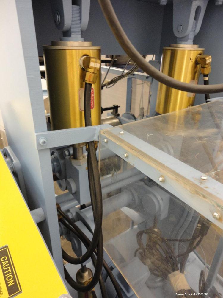 Used Killion 3 roll sheet stack with (3) top mounted pull rolls, (1) 4-1/2'' diameter x 10'' wide rubber roll, and (2) 4'' diameter x 10'' wide adhesive rolls, driven by a 1/4 hp DC gear motor, (3) m...