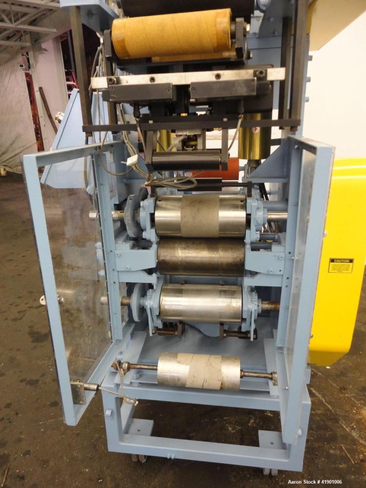 Used Killion 3 roll sheet stack with (3) top mounted pull rolls, (1) 4-1/2'' diameter x 10'' wide rubber roll, and (2) 4'' diameter x 10'' wide adhesive rolls, driven by a 1/4 hp DC gear motor, (3) m...
