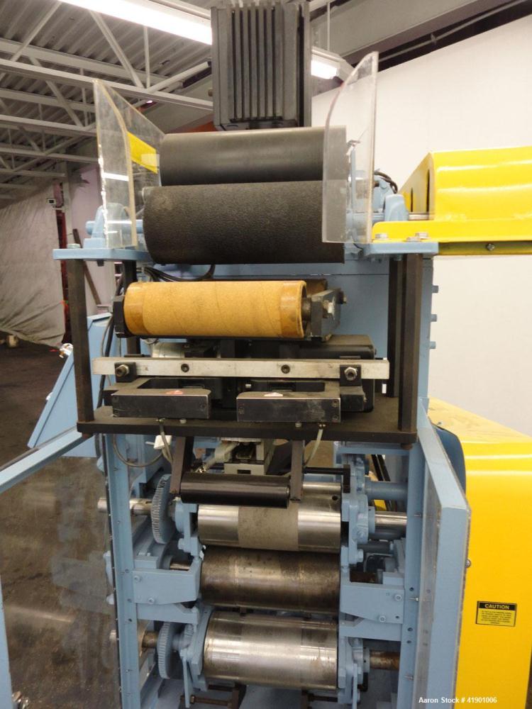 Used Killion 3 roll sheet stack with (3) top mounted pull rolls, (1) 4-1/2'' diameter x 10'' wide rubber roll, and (2) 4'' diameter x 10'' wide adhesive rolls, driven by a 1/4 hp DC gear motor, (3) m...