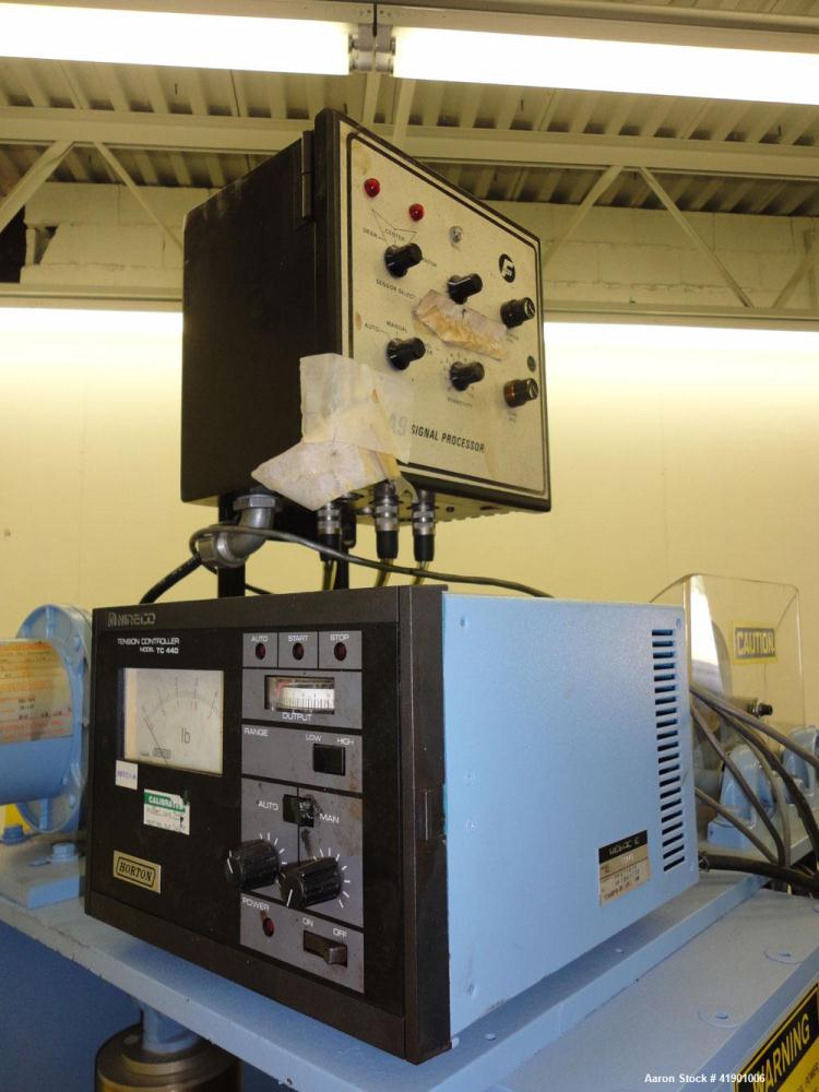 Used Killion 3 roll sheet stack with (3) top mounted pull rolls, (1) 4-1/2'' diameter x 10'' wide rubber roll, and (2) 4'' diameter x 10'' wide adhesive rolls, driven by a 1/4 hp DC gear motor, (3) m...