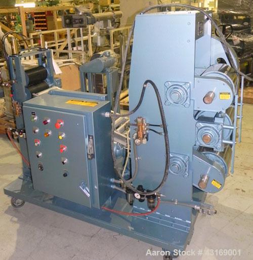 Used Killion 3 Roll Sheet Stack. (3) 10" Diameter x 10" wide chrome plated cored rolls, pneumatically adjustable. Driven by a 2 hp, 180 volt, 1750/2050 rpm DC gear motor, ratio 60 to 1.  (1) Pull rol...