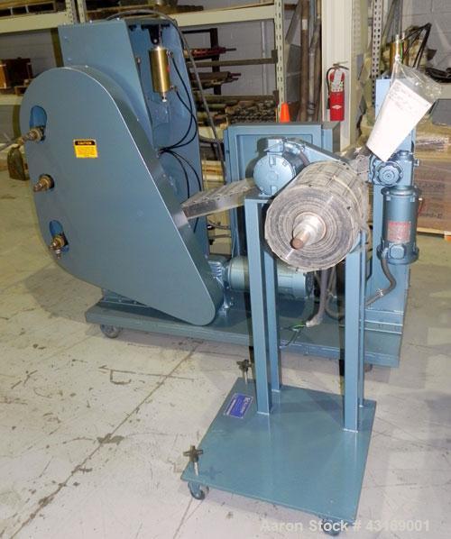 Used Killion 3 Roll Sheet Stack. (3) 10" Diameter x 10" wide chrome plated cored rolls, pneumatically adjustable. Driven by a 2 hp, 180 volt, 1750/2050 rpm DC gear motor, ratio 60 to 1.  (1) Pull rol...