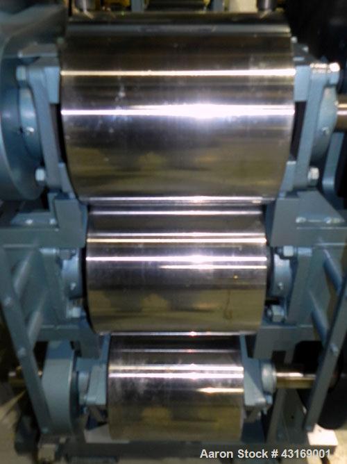 Used Killion 3 Roll Sheet Stack. (3) 10" Diameter x 10" wide chrome plated cored rolls, pneumatically adjustable. Driven by a 2 hp, 180 volt, 1750/2050 rpm DC gear motor, ratio 60 to 1.  (1) Pull rol...