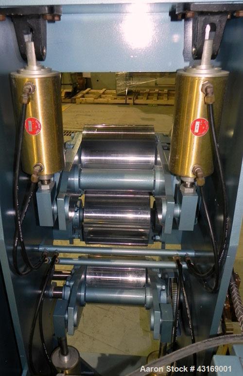 Used Killion 3 Roll Sheet Stack. (3) 10" Diameter x 10" wide chrome plated cored rolls, pneumatically adjustable. Driven by a 2 hp, 180 volt, 1750/2050 rpm DC gear motor, ratio 60 to 1.  (1) Pull rol...