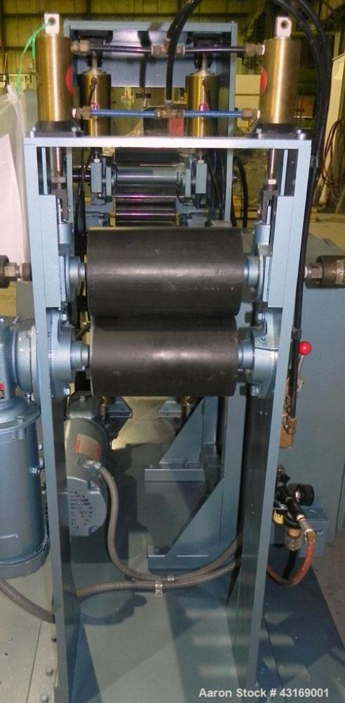 Used Killion 3 Roll Sheet Stack. (3) 10" Diameter x 10" wide chrome plated cored rolls, pneumatically adjustable. Driven by a 2 hp, 180 volt, 1750/2050 rpm DC gear motor, ratio 60 to 1.  (1) Pull rol...