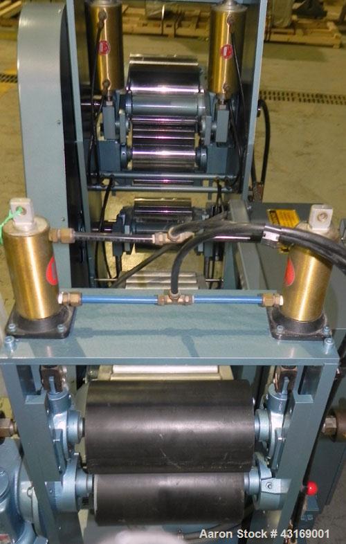 Used Killion 3 Roll Sheet Stack. (3) 10" Diameter x 10" wide chrome plated cored rolls, pneumatically adjustable. Driven by a 2 hp, 180 volt, 1750/2050 rpm DC gear motor, ratio 60 to 1.  (1) Pull rol...