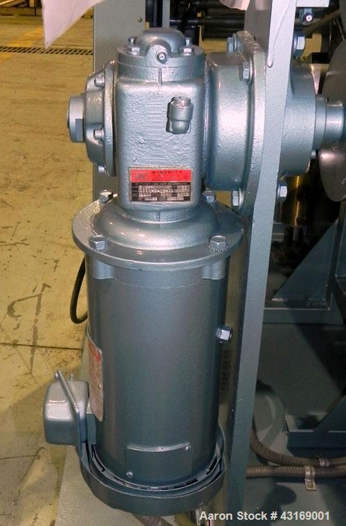 Used Killion 3 Roll Sheet Stack. (3) 10" Diameter x 10" wide chrome plated cored rolls, pneumatically adjustable. Driven by a 2 hp, 180 volt, 1750/2050 rpm DC gear motor, ratio 60 to 1.  (1) Pull rol...