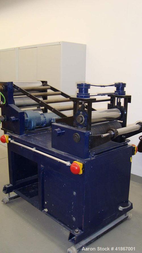 Used Leistriz Lab Size 3 Roll Sheet Stack. (3) 5.85" diameter x 15.6" straight side, 2 fixed and 1 removable chromed rolls, steam heated rolls. Includes downstream/haul-off. (2) Gearboxes driven by (...