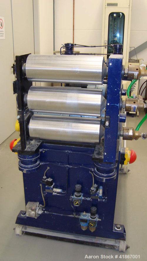 Used Leistriz Lab Size 3 Roll Sheet Stack. (3) 5.85" diameter x 15.6" straight side, 2 fixed and 1 removable chromed rolls, steam heated rolls. Includes downstream/haul-off. (2) Gearboxes driven by (...