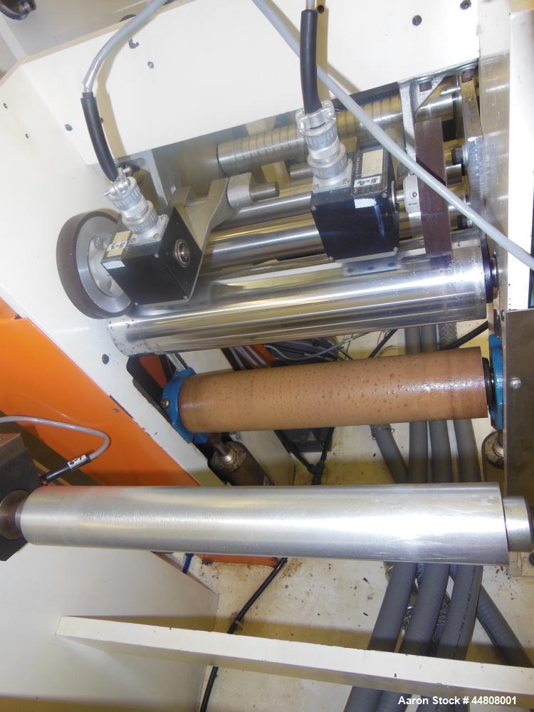 Used Leistritz Three Roll Sheet Stack. (3) Chrome plated cored rolls, 6" diameter 14" wide face. Each roll pneumatically adjustable, and driven by a 3/4 HP, 180 Volt, 1750 RPM DC gear motor, ratio 60...