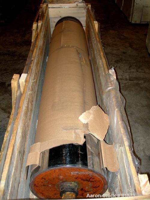 USED: NRM 78" wide 3 roll sheet stack. (1) 16" diameter pattern cored roll, (2) 16" diameter chrome cored rolls, manually adjustable. Driven by a 5 hp, 180 volt DC motor with reducers. Frame mounted ...