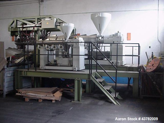 Used Periplast Sheet Extrusion Line. handling film width of  49.2” (1250 mm), 3 layers. Including (1) Single screw extruder 3.54” (90 mm) diameter. (1) Single screw co-extruder 2.36“ (60 mm).  (1) Li...