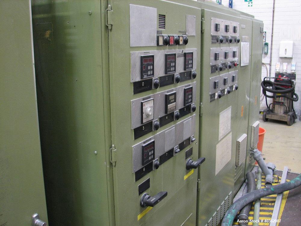Used Reifenhauser Model EH 650-1-90 Sheet Extrusion Line. Maximum output 771 lbs (350 kilos/hour). Screw diameter 3.5" (90mm). Calendar roll width 35.4" (900mm) diameter 15.3" (390mm). Also comprisin...