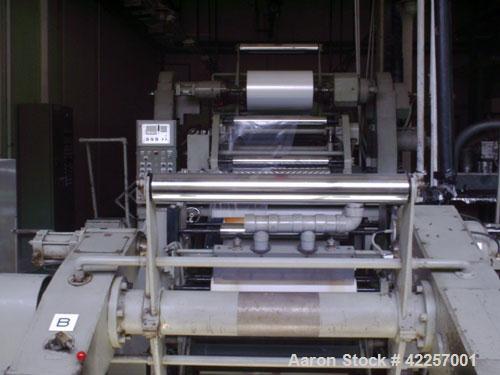 Used Sumitomo Heavy Industries EC 075-T Tandem Extrusion Coating Line, laminator for producing laminated foil for tubes for cosmetic production. Capable of producing ABL foil from 5 layer film with a...