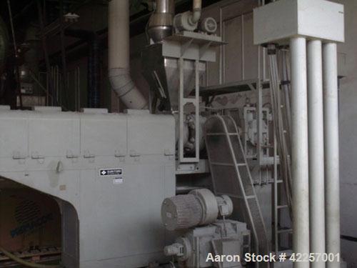 Used Sumitomo Heavy Industries EC 075-T Tandem Extrusion Coating Line, laminator for producing laminated foil for tubes for cosmetic production. Capable of producing ABL foil from 5 layer film with a...