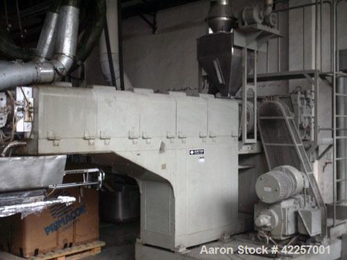 Used Sumitomo Heavy Industries EC 075-T Tandem Extrusion Coating Line, laminator for producing laminated foil for tubes for cosmetic production. Capable of producing ABL foil from 5 layer film with a...