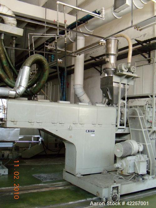Used Sumitomo Heavy Industries EC 075-T Tandem Extrusion Coating Line, laminator for producing laminated foil for tubes for cosmetic production. Capable of producing ABL foil from 5 layer film with a...