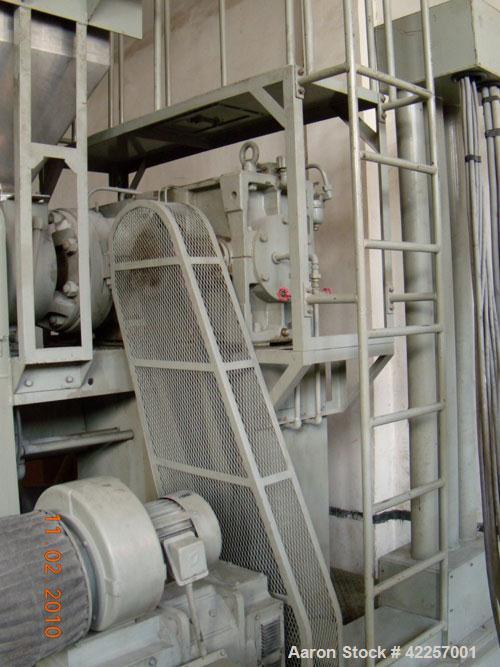 Used Sumitomo Heavy Industries EC 075-T Tandem Extrusion Coating Line, laminator for producing laminated foil for tubes for cosmetic production. Capable of producing ABL foil from 5 layer film with a...