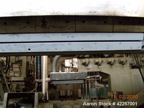 Used Sumitomo Heavy Industries EC 075-T Tandem Extrusion Coating Line, laminator for producing laminated foil for tubes for cosmetic production. Capable of producing ABL foil from 5 layer film with a...