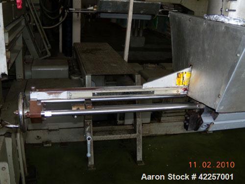 Used Sumitomo Heavy Industries EC 075-T Tandem Extrusion Coating Line, laminator for producing laminated foil for tubes for cosmetic production. Capable of producing ABL foil from 5 layer film with a...