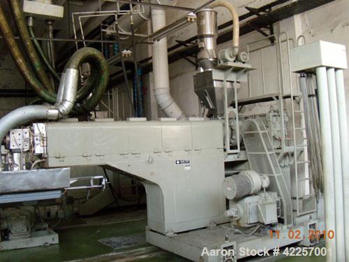 Used Sumitomo Heavy Industries EC 075-T Tandem Extrusion Coating Line, laminator for producing laminated foil for tubes for cosmetic production. Capable of producing ABL foil from 5 layer film with a...
