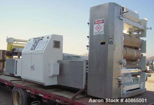  (1) 3 roll sheet stack with (3) 12" diameter x 41" wide chrome plated rolls, and (2) 12" diameter x 41" wide pattern rolls, with pumps, heat exchangers, control panel, and 16' long cooling section. ...